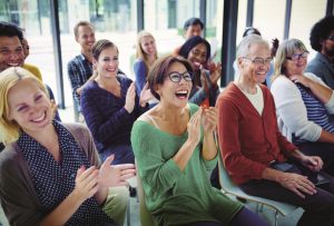 Financial Wellbeing Workshop Participants Clap Laugh