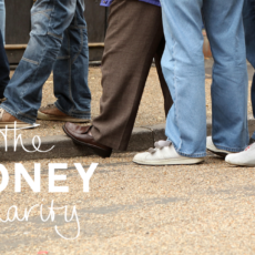 The Money Statistics June 2024 - UK’s Improving Big Picture Yet to Impact Individuals - Image shows the lower halves of a group of people, all standing in a line or queue, giving the impression of people waiting for something.